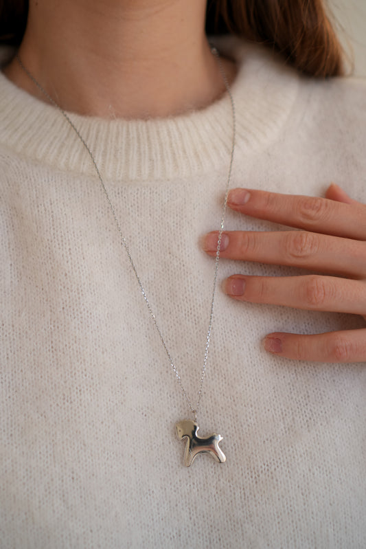 Кулон Коник